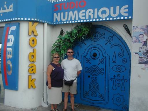 in front of a nice blue door ... tunisias favourite colour ...